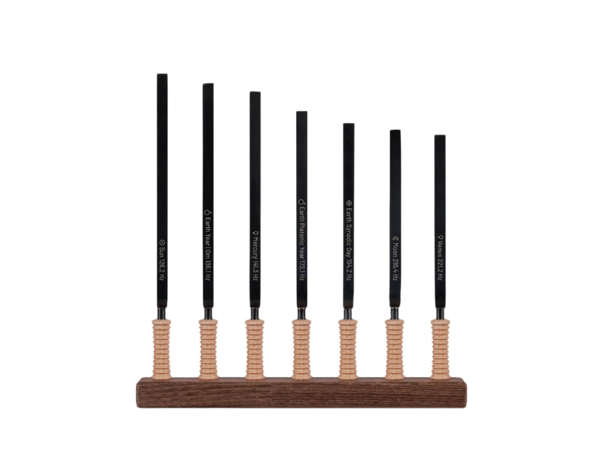 Set of seven planetary tuning forks mounted on a wooden base for chakra balancing