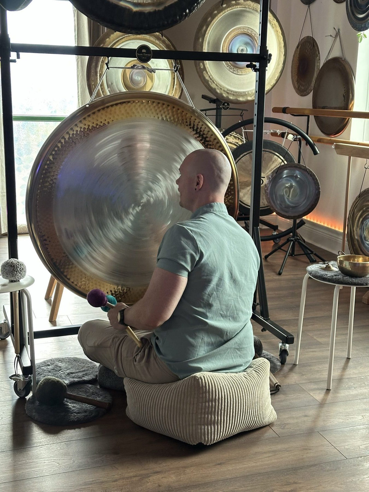 Gong playing in the Revival Harmony studio