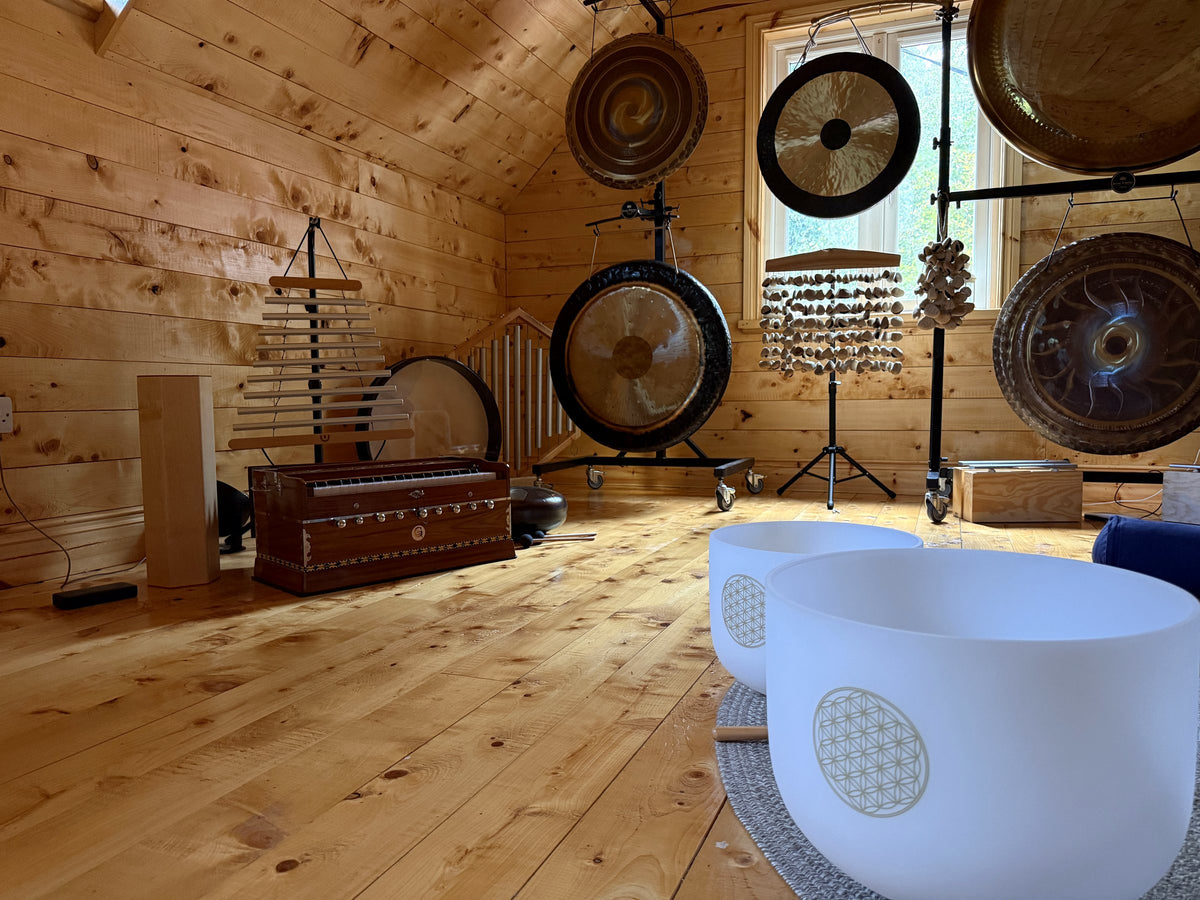 The bright wooden training loft with crystal bowls and gongs