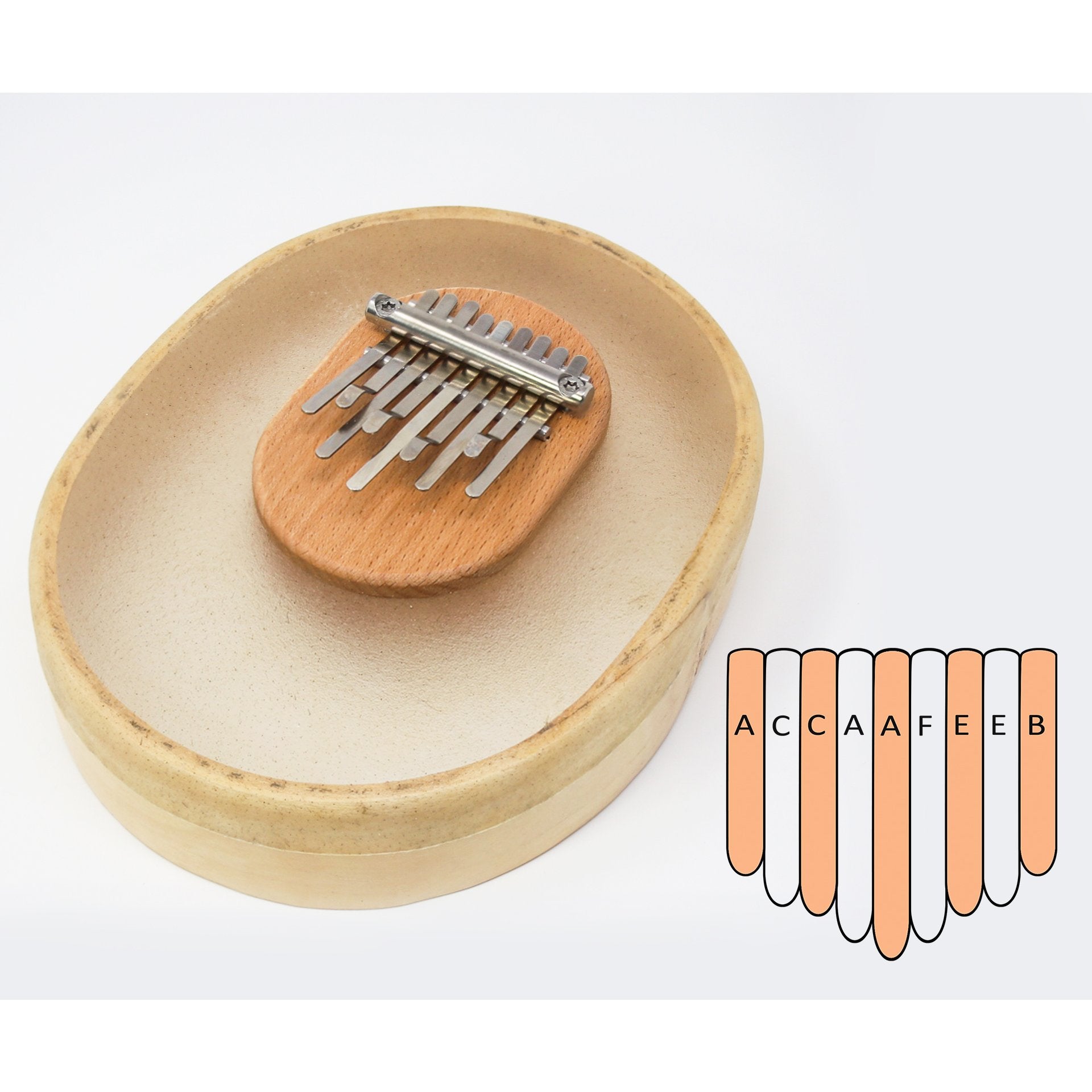 Transparent 8+1 note kalimba with calf-skin bowl and wooden bridge, metal tines and note labels